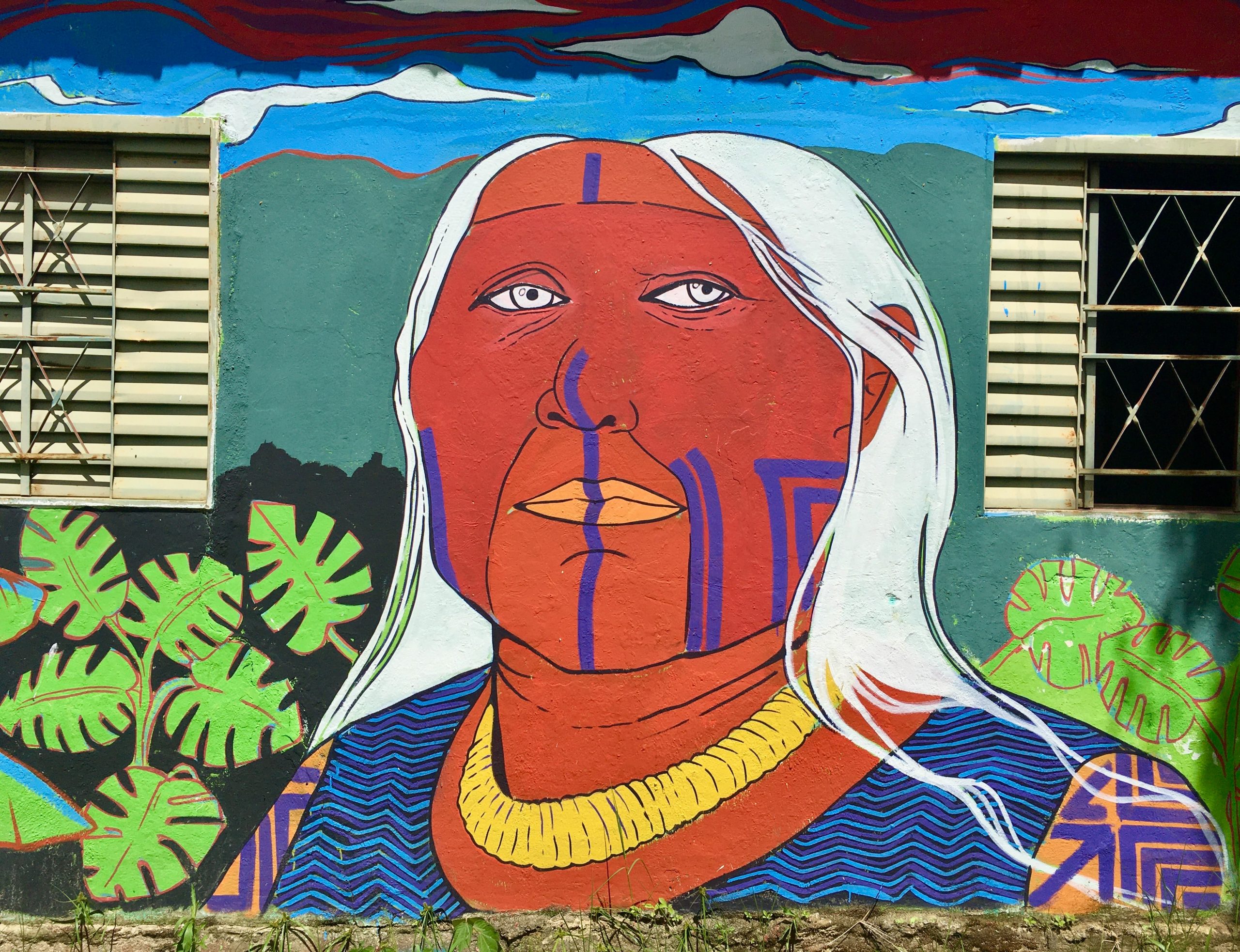 Mural dengan wajah masyarakat adat